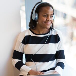 woman listening on headphones